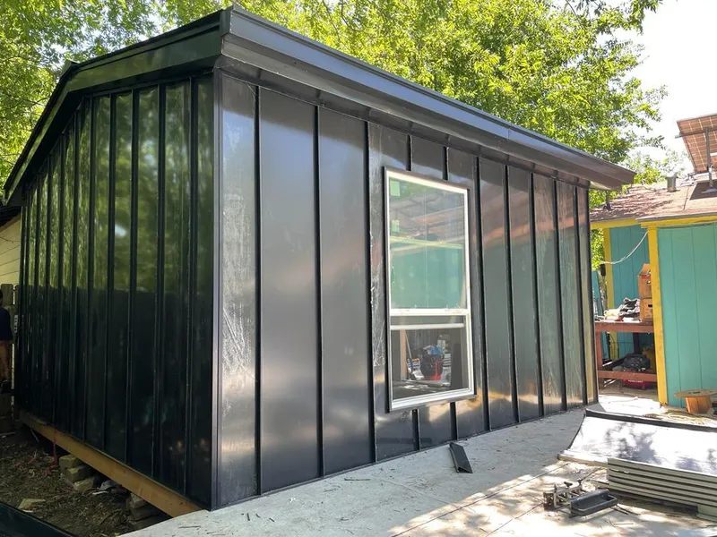 Black standing seam metal wall panels for Roof Inspection in Truth or Consequences